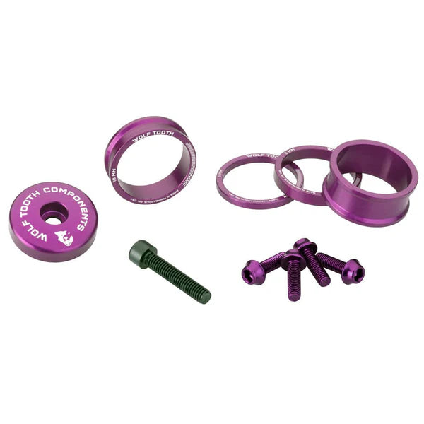 Välikappaleet, varren suojus ja ruuvipaketti WOLFTOOTH BLING KIT Ultravioletti