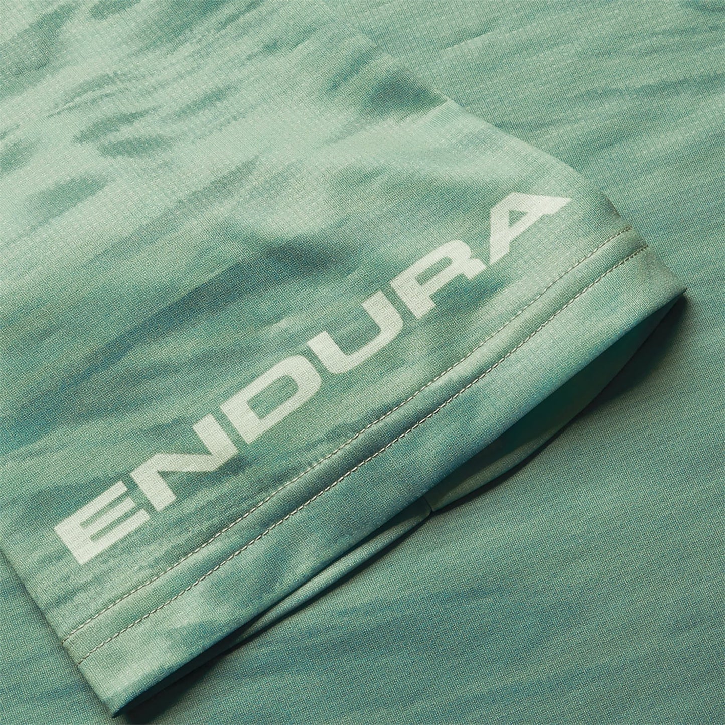 ENDURA MARBLE LTD PRINTED lyhythihainen trikoo vihreä 2025
