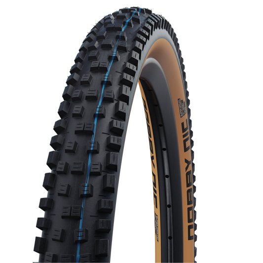 SCHWALBE NOBBY NIC 27.5x2.40 ADDIX SPEEDGRIP SUPERGROUND Tubeless Ready Pehmeä musta/ruskea rengas